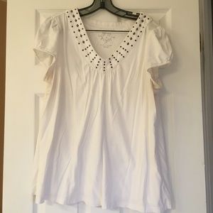 White shirt with small studding at neckline